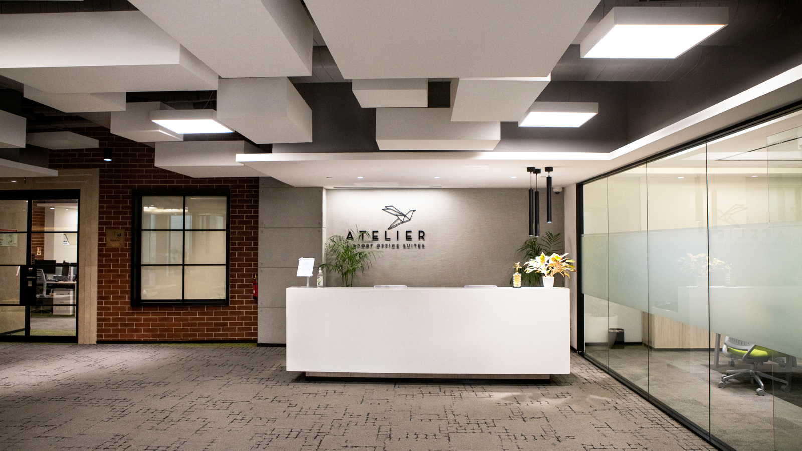 Modern dental clinic reception area with clean design, indoor plants, and a welcoming front desk — ideal for patients seeking professional and comfortable dental care in a local clinic.